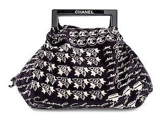 A Chanel Black Velvet Frame Handle Hobo Bag, 11" x 14.5" x 2.5".