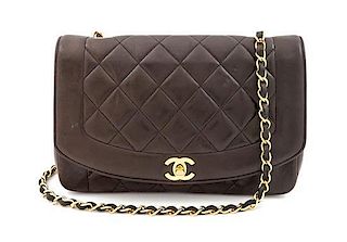 A Chanel Brown Leather Quilted Flap Handbag, 11" x 6.5" x 3"; Strap drop: 18".
