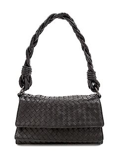 A Bottega Veneta Black Intrecciato Leather Double Flap Handbag, 10" x 7" x 4".
