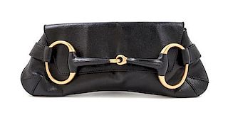 A Gucci Black Leather Horsebit Clutch, 6" x 15" x 3".