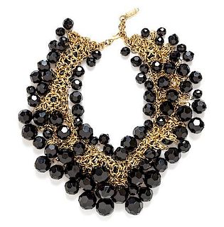 An Yves Saint Laurent Goldtone and Black Bead Cluster Necklace, 16.75" long with a 2.25" extension.