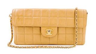 * A Chanel Tan Leather Quilted Flap Bag, 10.25" x 5.25" x 1.75"; Strap drop 12".
