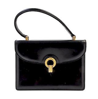 A Gucci Black Leather Flap Handbag, 9" x 6.5" x 3"; Top handle 5".