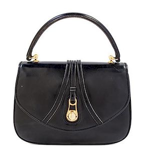 * A Gucci Black Leather Rounded Flap Handbag, 10" x 7.5" x 1.5".
