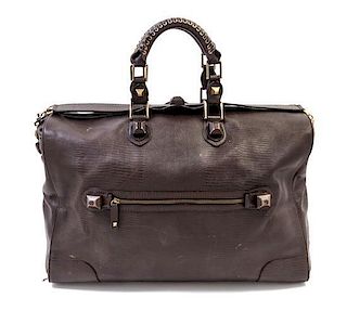 A Balenciaga Dark Brown Leather Duffle Bag, 20" x 10" x 14".