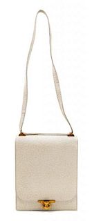 * An Hermes Ostrich Flap Handbag. 7.5" x 9" x 2".