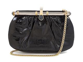 A Judith Leiber Black Leather Embossed Handbag, 8.5" x 5.5" x 1"; Strap drop: 21".