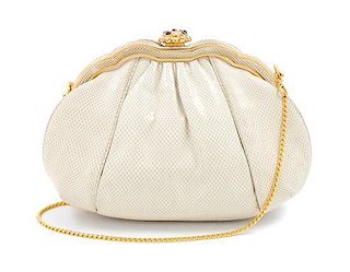 A Judith Leiber Cream Skin Handbag, 8.5" x 6" x 2".
