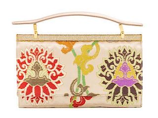 * A Judith Leiber Champagne Satin Embroidered Envelope Handbag, 7.25" x 4.25" x 1.5"; Handle drop: 1.25".