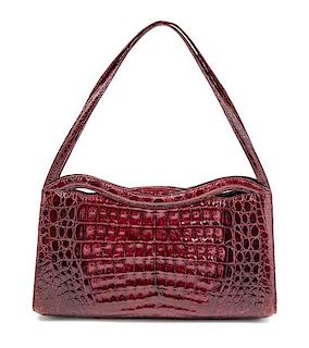 A Nancy Gonzales Maroon Crocodile Handbag, 10" x 5.5" x 2.75"; Strap drop: 6".