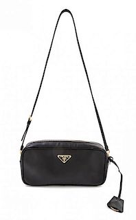 A Prada Black Saffiano Leather Handbag, 10.5" x 5.5" x 2"; Strap drop: 14".