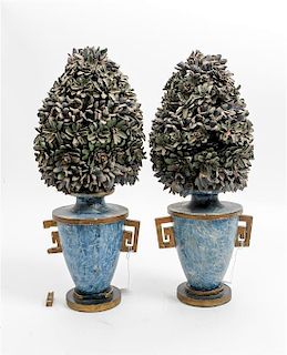 * A Pair of Painted and Parcel Gilt Wood Urns Height 16 inches.