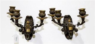 * A Pair of Continental Three-Light Cast Metal Wall Sconces