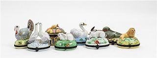 * Eight Limoges Porcelain Boxes Height of tallest 4 inches.