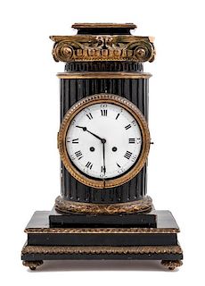 A Continental Ebonized and Giltwood Mantel Clock and Stand