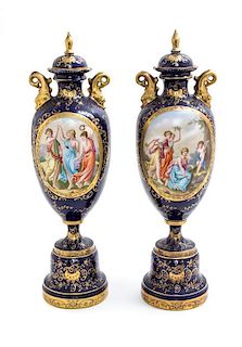 A Pair of Vienna Style Cobalt Urns Height of each 18 1/2 inches.