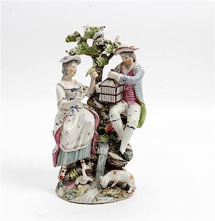 * An English Bocage Figural Group Height 10 3/4 inches.