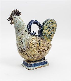 * An English Ceramic Model of a Rooster Width 11 inches.