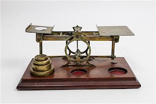 * An English Brass Postal Scale, S. Mordan Width 9 1/2 inches.