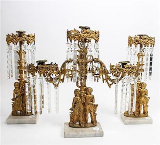 * A Victorian Gilt Brass and Marble Three-Piece Figural Garniture Height of tallest 17 inches.