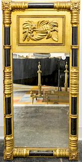 A Federal Gilt and Ebonized Mirror Height 38 1/2 x width 18 inches.