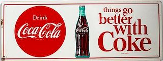 * A Vintage Metal Coca-Cola Advertising Sign 12 x 31 3/4 inches.