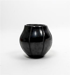 A Santa Clara Blackware Vase, Peggy Tafoya Height 5 5/8 inches.