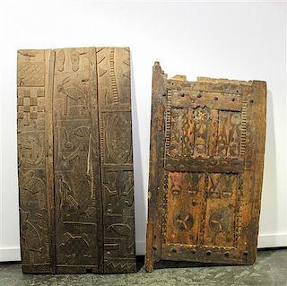 * A Pair of Carved Wood Doors Height of tallest 58 inches.