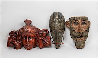 * Two African Masks Height of tallest 12 1/2 inches.