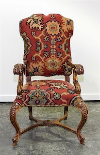 A Henri II Style Open Armchair Height 48 1/2 inches.