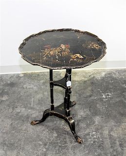 * An English Lacquered Tea Table Height 27 x width 20 1/2 x depth 17 1/2 inches.