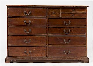 * A Provincial Chest of Drawers Height 34 x width 49 1/4 x depth 18 1/2 inches.