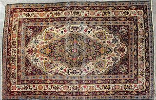 An Isfahan Wool Rug 6 feet 8 1/4 inches x 4 feet 5 inches.