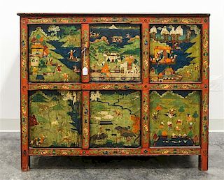 * A Tibetan Lacquered and Painted Elmwood Cabinet