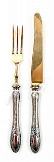 * A French Silver-Gilt and Plated Fruit Knife and Fork Length of fruit knife 6 7/8 inches.