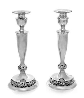 * A Pair of American Silver Candlesticks, Mueck-Carey, Mid-20th Century, of baluster form with openwork base.