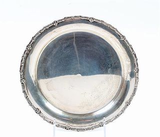 * A Portuguese Silver Plate, 19TH/20TH CENTURY, of circular form with decorated edge.