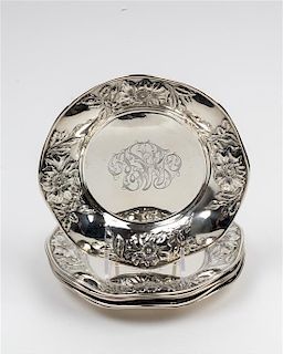 A Set of Six American Silver Bread Plates, Likely Adelphi Silver Co., New York, NY, the rims worked with repousse floral and