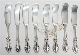 A Set of Eight American Silver Butter Spreaders, Concord Silver Company, Concord, NH, Georgian Shell pattern.