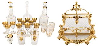 A FRENCH GLASS AND ORMOLU CORDIAL SET WITH THREE DECANTERS