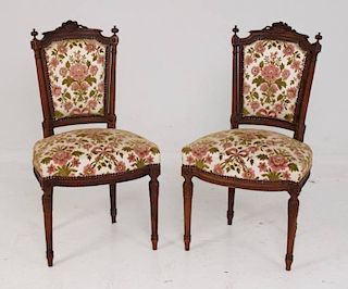 PAIR OF FRENCH LOUIS XV CARVED WALNUT FAUTEUILS