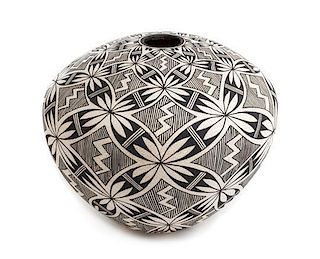 A Marie Zieu Chino (Acoma, 1907-1982), Fineline Black on White Seed Jar Height 6 1/2 x diameter 8 inches
