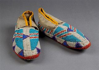 A Pair of Sioux Fully Beaded Moccasins Length 9 3/4 inches