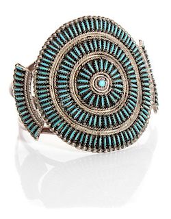 A Zuni Silver and Turquoise Petit Point Concha Belt and Bracelet Length of belt 38 inches.