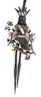 A Zuni Multi-Stone Gan Dancer Bolo Height 5 inches.
