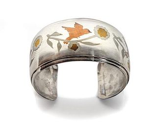 A Cheyenne Inlaid Mixed Metal Cuff, Ben Nighthorse Campbell (b. 1933) Length 5 1/2 x opening 1 x width 1 1/4 inches.