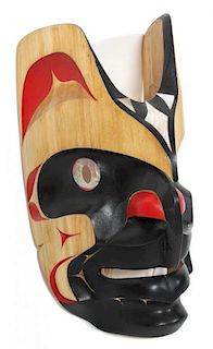A Northwest Coast Carved Wood Bookwus Mask, Ed Noisecat Height 12 inches.