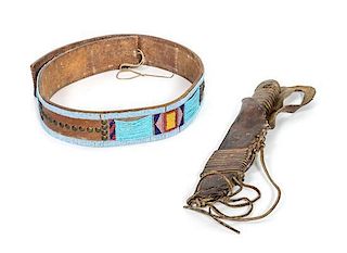 A Crow Beaded Leather and Tacked Panel Belt Length of belt 36 inches.