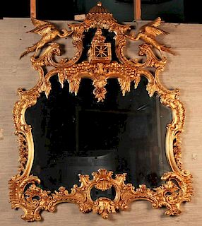 LARGE CHIPPENDALE STYLE CARVED GILTWOOD MIRROR