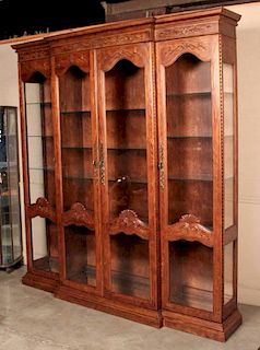 FRENCH PROVINCIAL STYLE CARVED OAK BOOKCASE